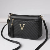Valette Tassel Zip Crossbody - Vellegra